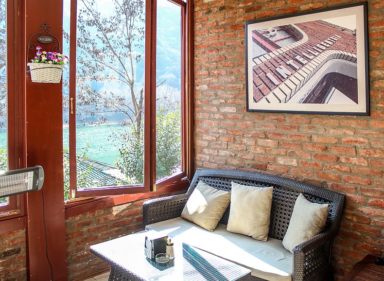 Cozy sofa and great view towards Turtle lake