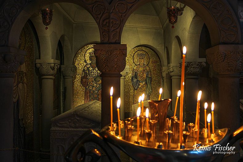 Prayer candles and icons at Samtvaro monastery