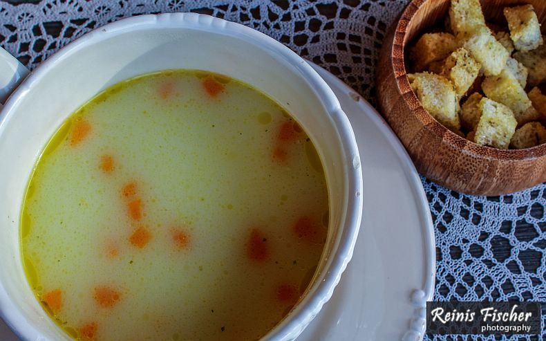 Cheese soup served with croutons