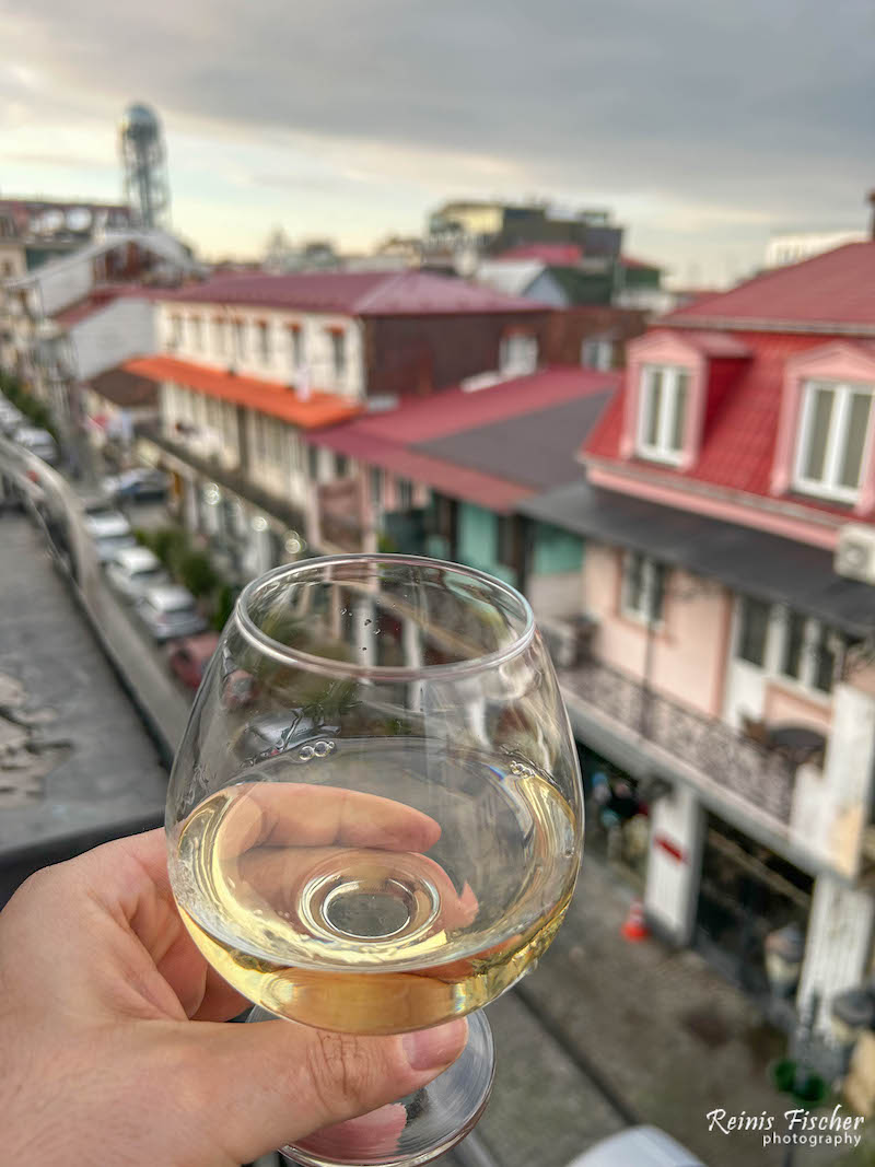 Sipping Tvishi wine from the balcony at Galogre hotel in Batumi