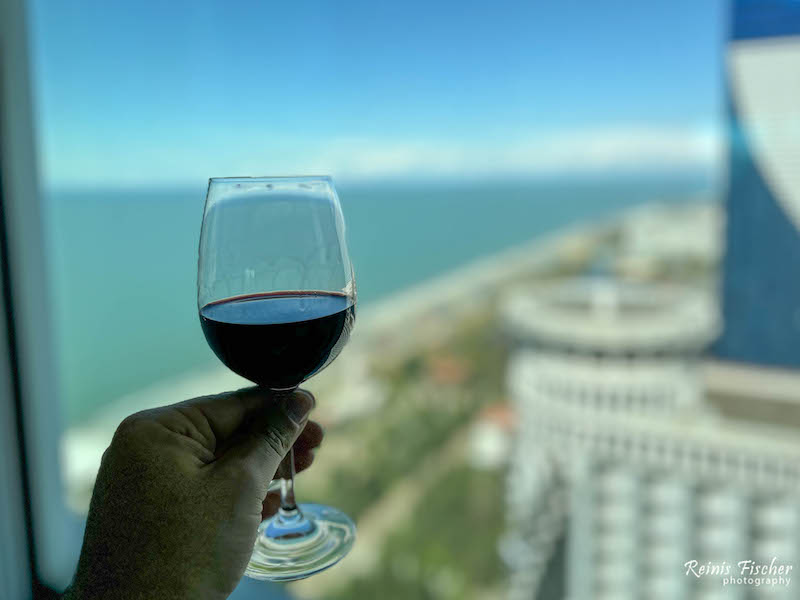 Glass of Khindzmarauli wine at Panorama Batumi restaurant