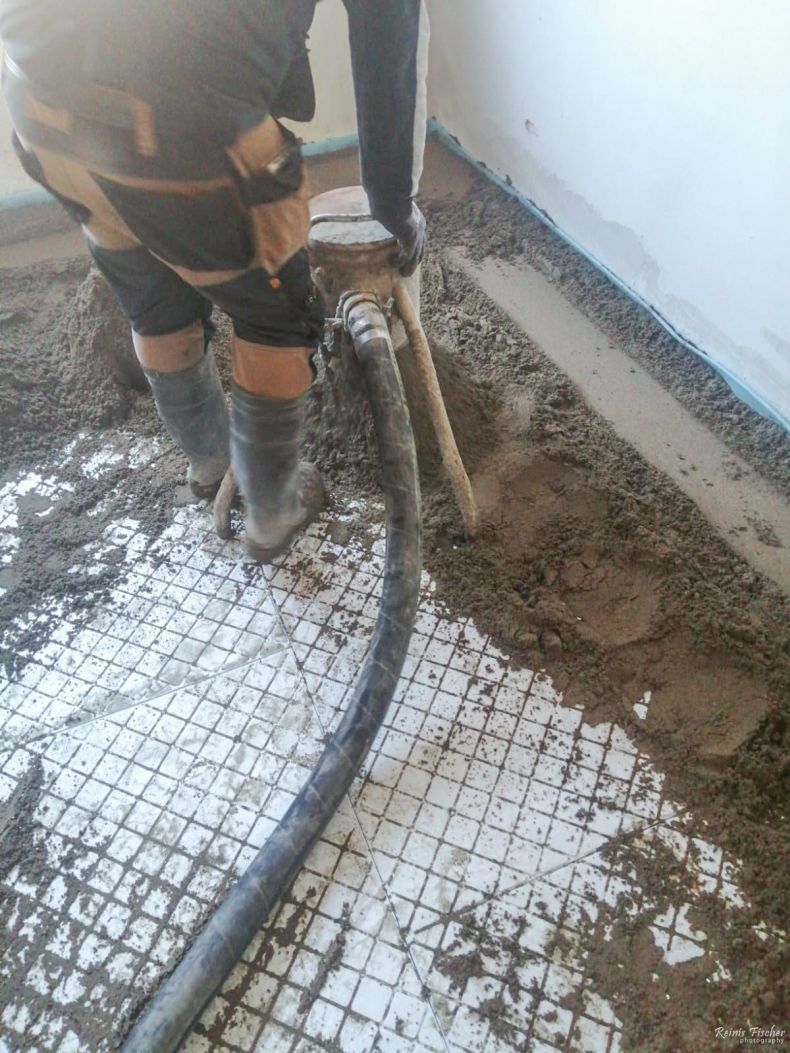 Pouring in new concrete floor