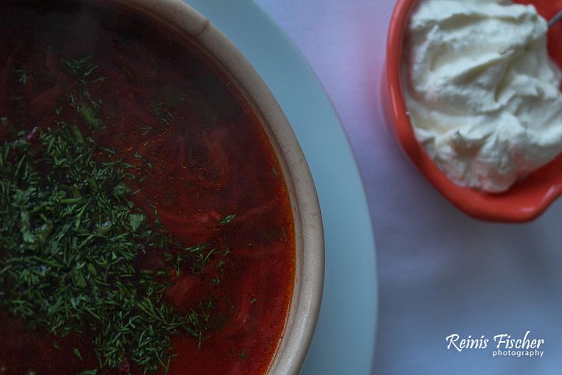 Traditional Ukrainian Borsch served with smetana (sour cream)