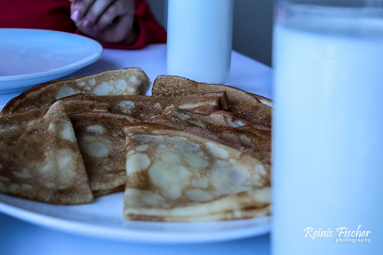 Pancakes served with cold milk