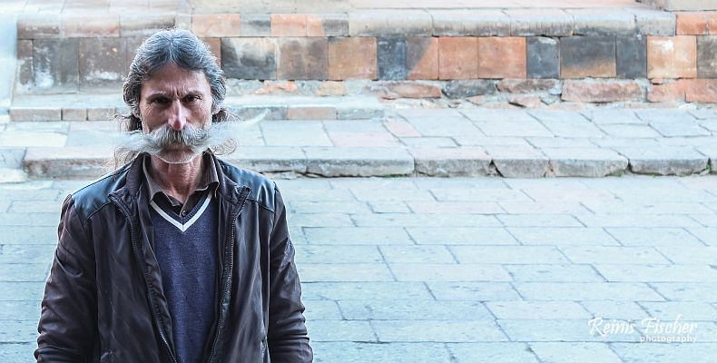 Monk with long moustache