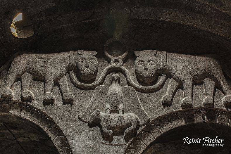 Rock cut chained lions