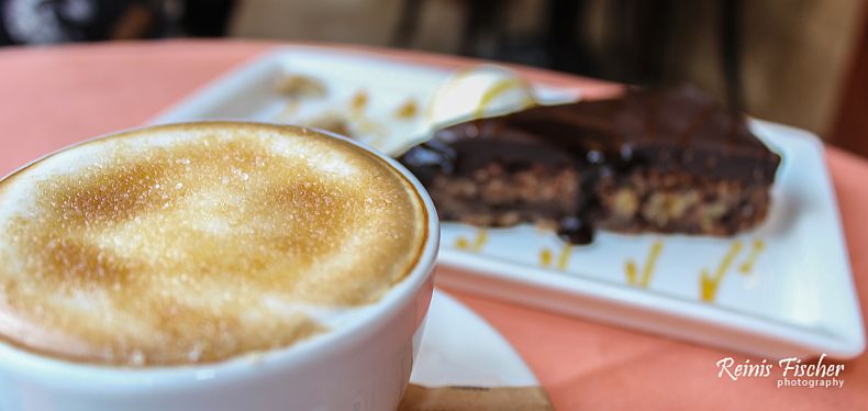 Tiramisu cake and cup of morning coffee