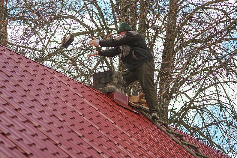 Removing old bricks from chimney