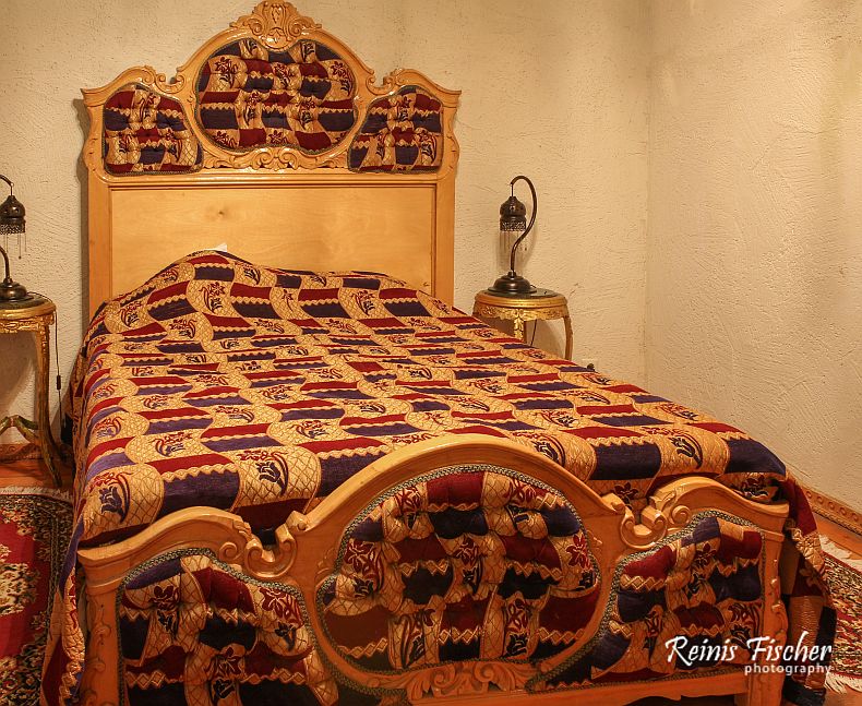 Queen size bed at Royal Fontaine hotel