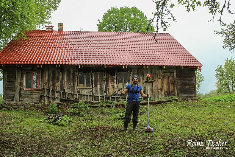 Author of this blog captured in action - trimming grass (2016)
