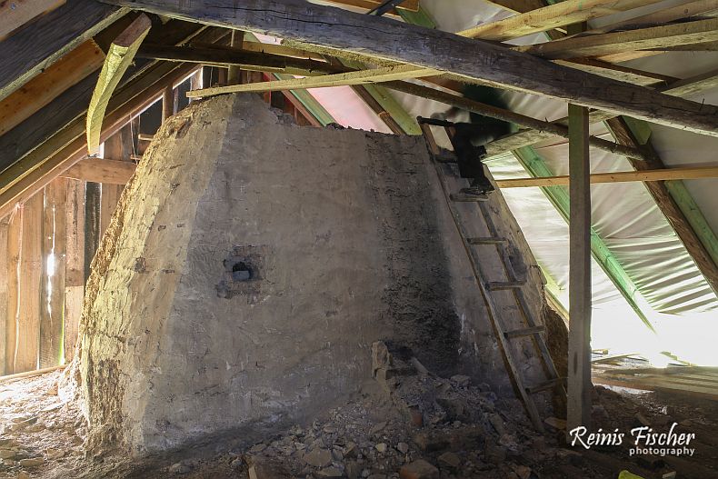 Workers a top on the chimney