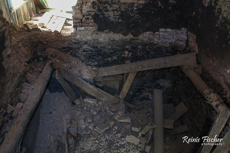 Broken ceiling and chimney