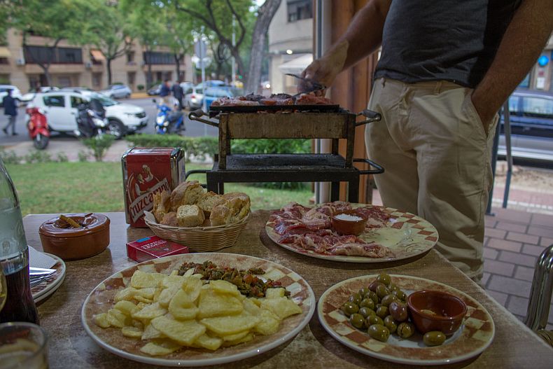 Author of this blog captured in action - grilling Iberian steak