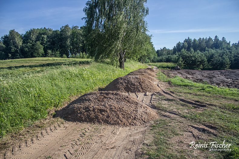 Piles of gravel on the road