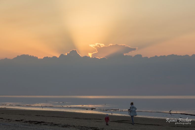 Story telling photo - mother and child in a sunset