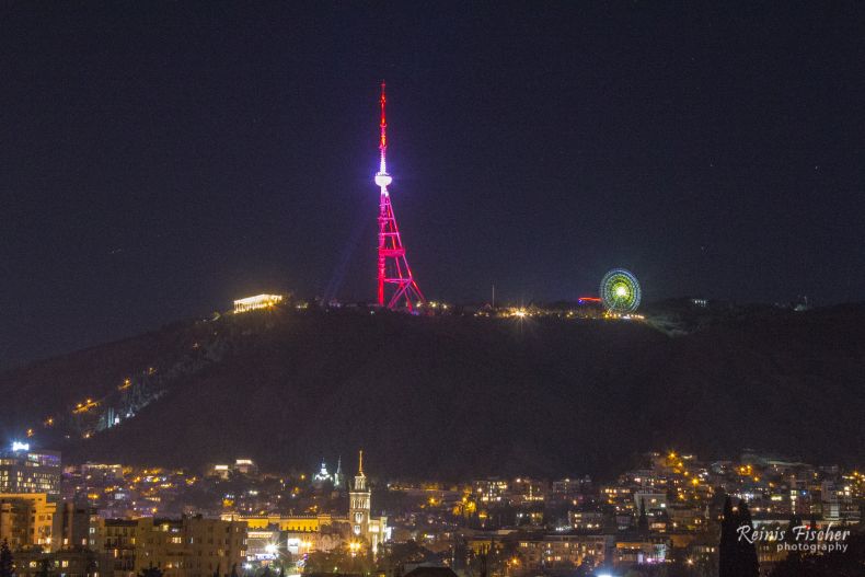 Tbilisi TV tower in the national colors of Latvia