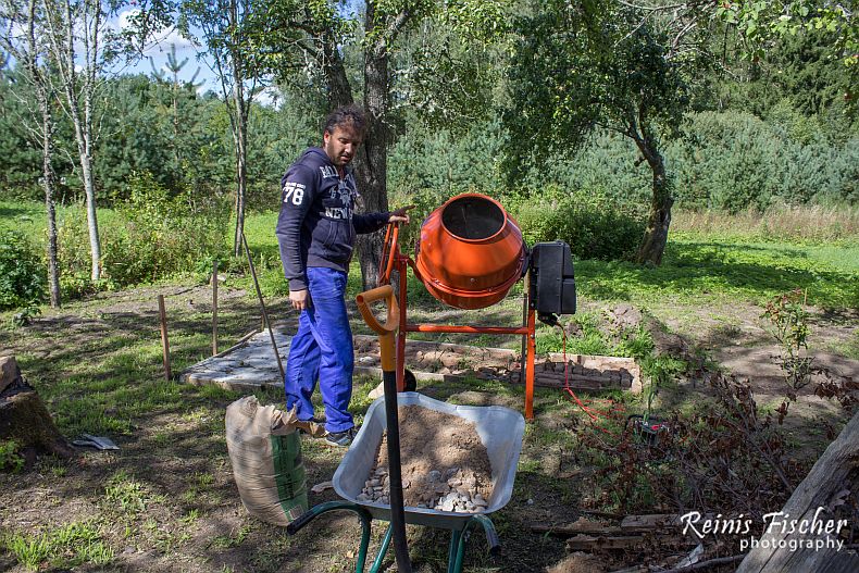 Let's mix some concrete- author of this blog captured in action