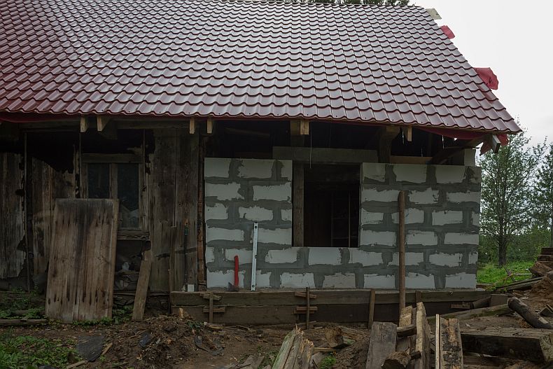 Lintel installed over window opening