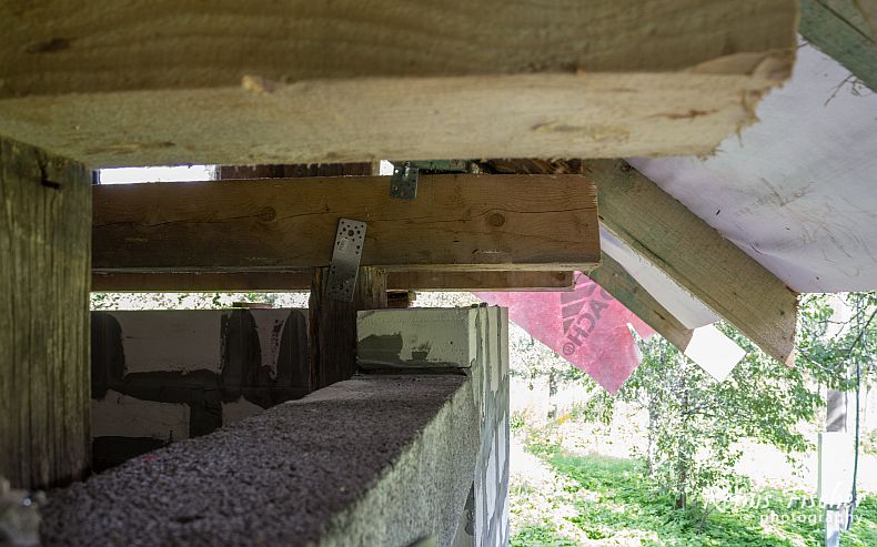 Wall and supporting beams