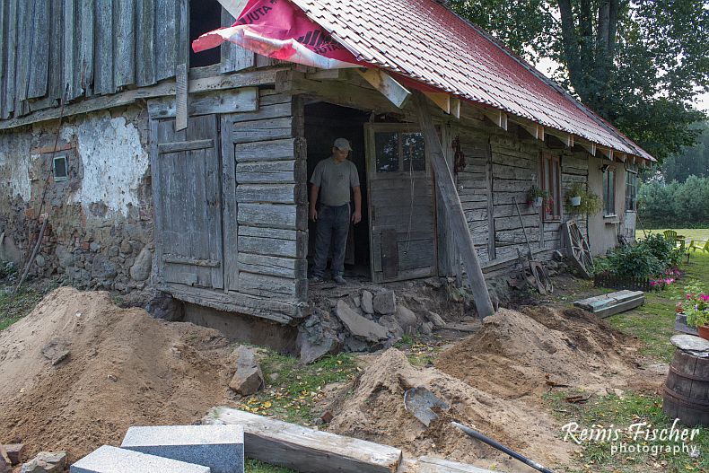 Demolishing log wall