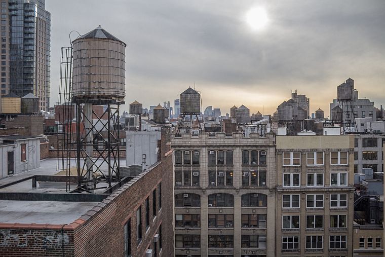Barrels a top of the New York city roofs