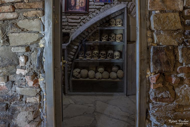 A chamber with skulls and bones