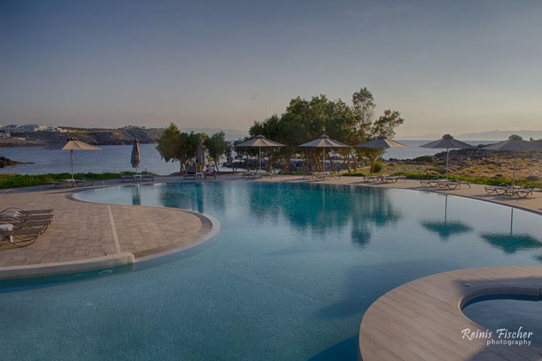 Outdoor pool at Kavos beach apartments
