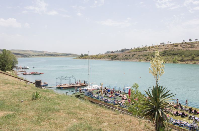 People getting tan on floating decks