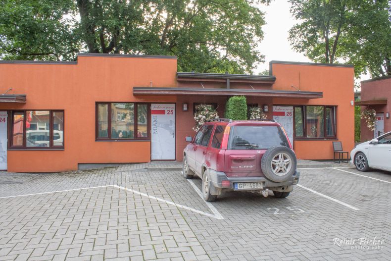 Free parking in front of the motel at Autosole Riga